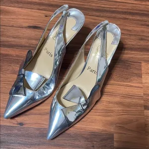 Christian Louboutin Elegant Silver Slingback Heels with bow made in Italy  42