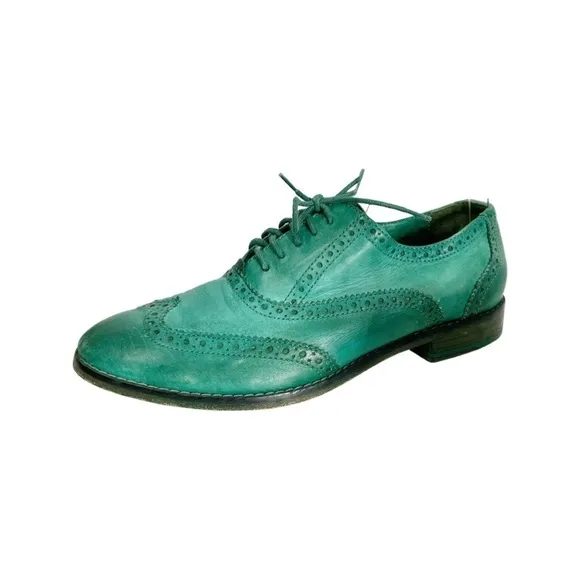 Cole Haan women size 6.5 B wingtip emerald green Oxford shoes. Style D37697