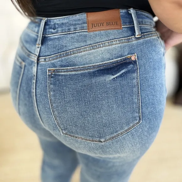 Judy Blue Mid-Rise Slim Fit Jeans Ridged Back Magic Released Raw Hem Denim Pants