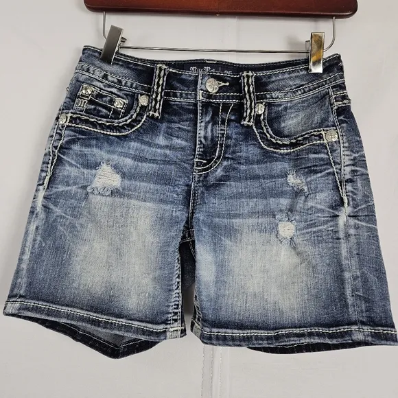 Miss Me mid-rise factory distressed shorts size 25