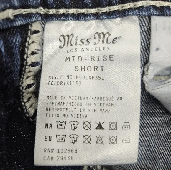 Miss Me mid-rise factory distressed shorts size 25