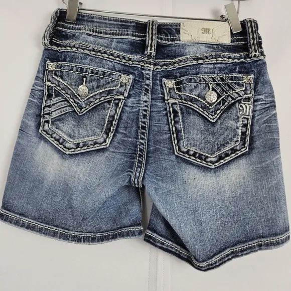 Miss Me mid-rise factory distressed shorts size 25