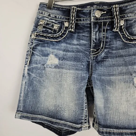 Miss Me mid-rise factory distressed shorts size 25