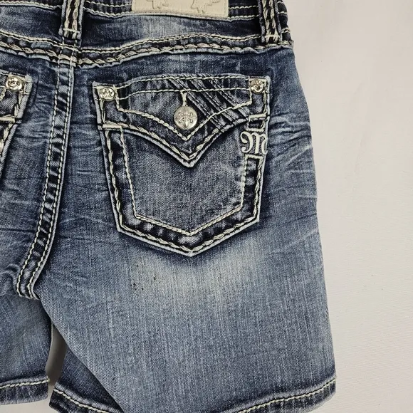 Miss Me mid-rise factory distressed shorts size 25