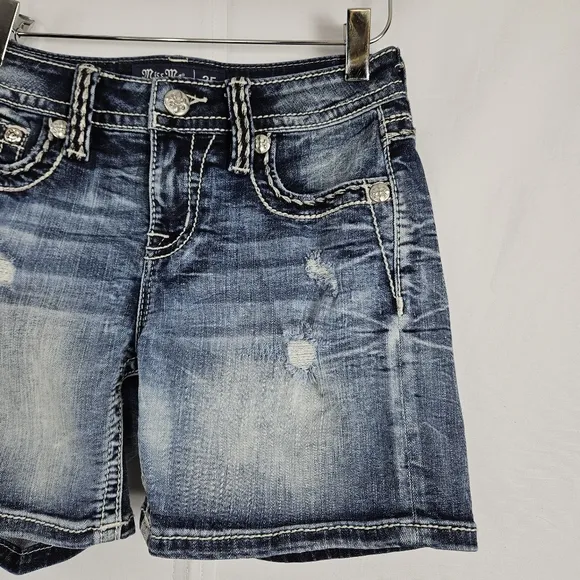 Miss Me mid-rise factory distressed shorts size 25