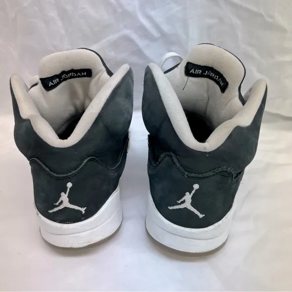 Nike Air Jordan 5 Retro Oreo tennis shoes.