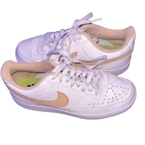 Nike ladies size 7.5 White and Peach tennis shoes