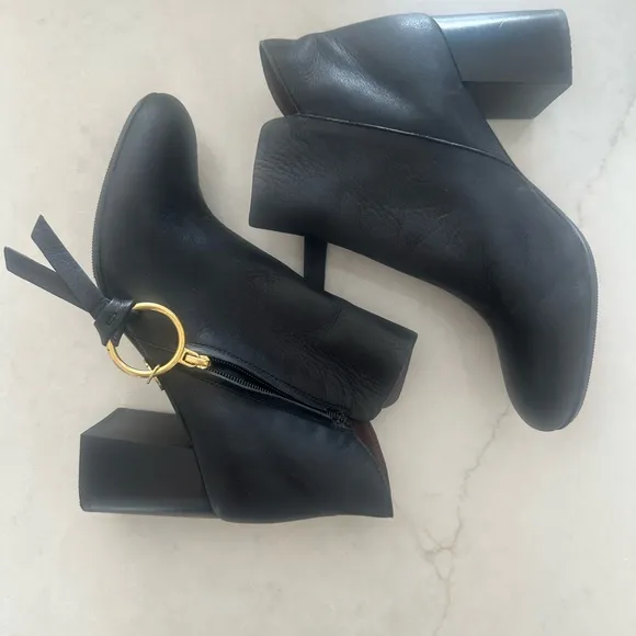 See by Chloe Elegant Black Ankle Boots with Gold Accent