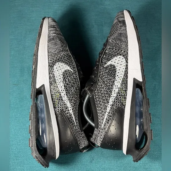 Size 9.5 - Men’s Nike Air Max Flyknit Racer shoes