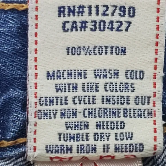 True Religion button fly factory distressed raw hem bermuda shorts size 27